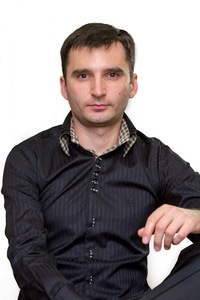 Александр Романенко