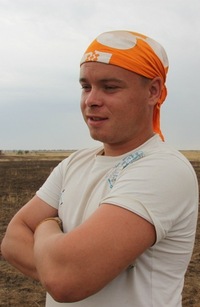 Александр Комин