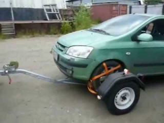 Прицеп-эвакуатор: буксировка частичной погрузкой