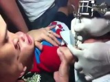 Video Abuse Mother Giving Her Baby Boy A Tattoo!.