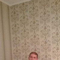 Михаил Куюмжу