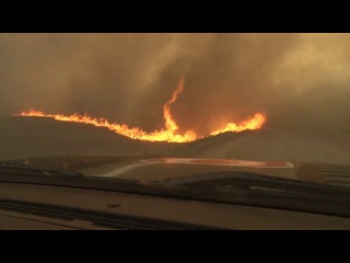 Man Escapes Road Grader Before Its Consumed by Fire