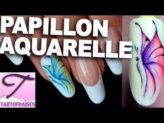 Nail art papillon aquarelle pastel