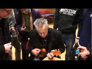 Tommy Emmanuel playing an ukulele! -