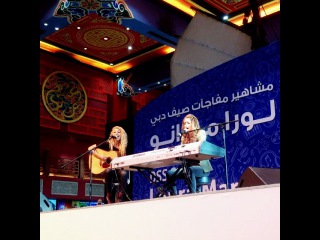 Dubai Summer Surprises on Instagram: “Let the show begin! @lauramarano and her lovely guitarist Ally have taken the stage here at Ibn Battuta Mall, and the crowd is loving it!…”
