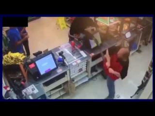 7 Eleven clerk disarms shotgun wielding man