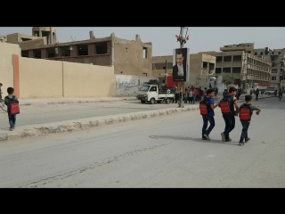 Children leaving school in Ayn Tarma, East Ghouta, Syria
