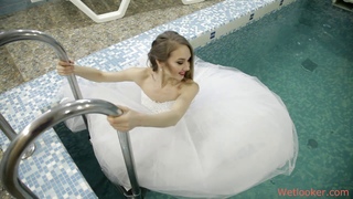 Girls are swimming in wedding dresses!