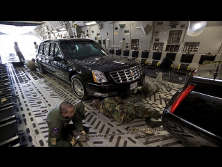 Air Force transport plane Boeing C-17 Globemaster provides transportation the Presidential Limousines and security detachments.