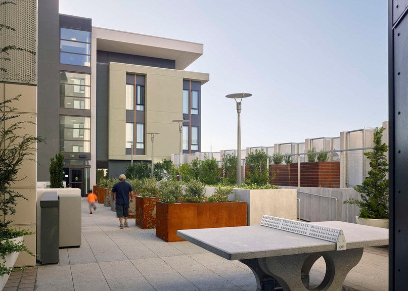 Three architecture studios complete low-cost housing complex