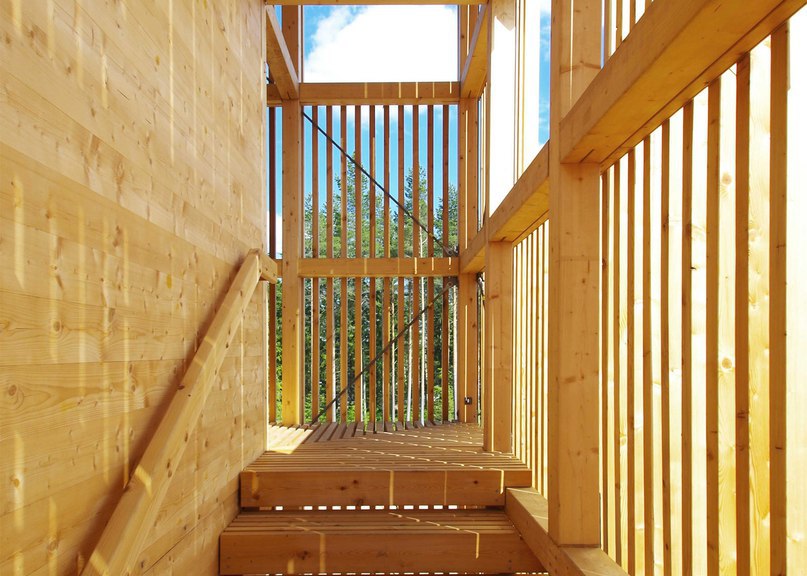 OOPEAA builds wooden Periscope Tower beside lake