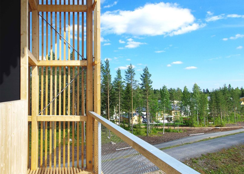 OOPEAA builds wooden Periscope Tower beside lake