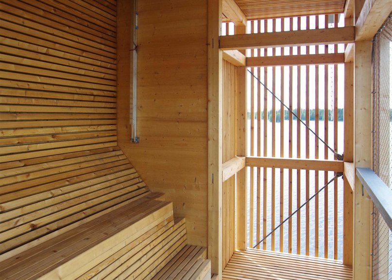 OOPEAA builds wooden Periscope Tower beside lake