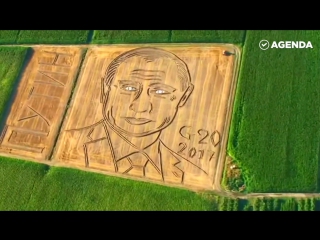 Портрет Путина трактором