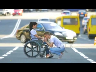 Carry Disabled Woman In The Wheelchair
