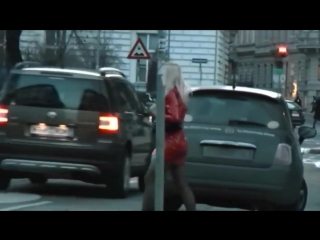 Sexy blonde in red mini skirt and tights