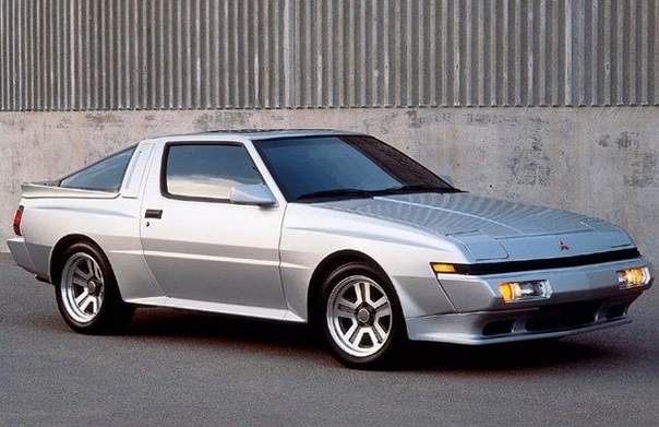 Обзор : Mitsubishi Starion 198290 Двигатель: 2.0 Turbo EX Мощность: 170 л.с. Крутящий момент: 245 Нм Коробка: Механика 5 ступ. Макс. скорость: 220 км/ч Разгон до сотни: 7.6 сек Привод: