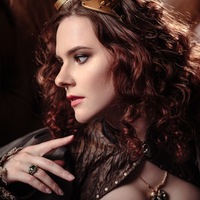 Елена Телкова