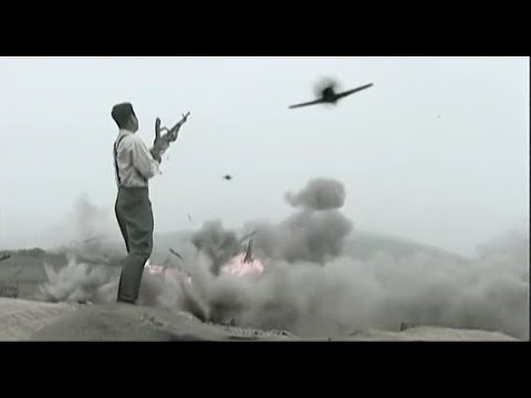 日軍出動飛機大炮對國軍陣地瘋狂轟炸,國軍長官面對漫天炮火毫不退35731