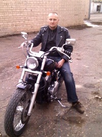 Александр Романенко
